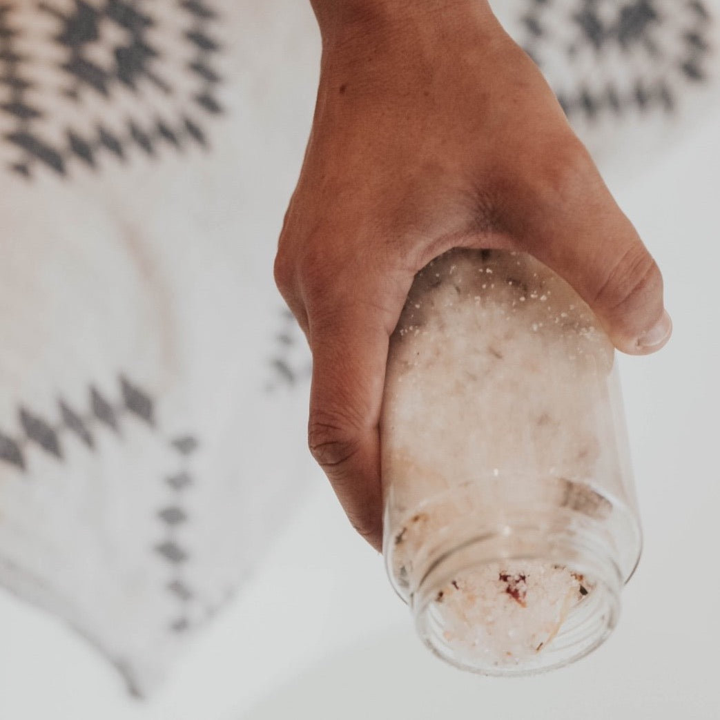 Botanical bath salts in the tub